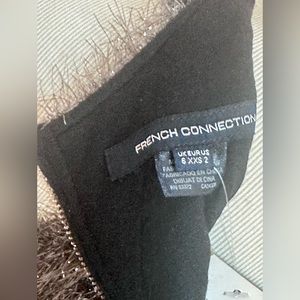 Sleeveless jumpsuit with cf & waist cut off details